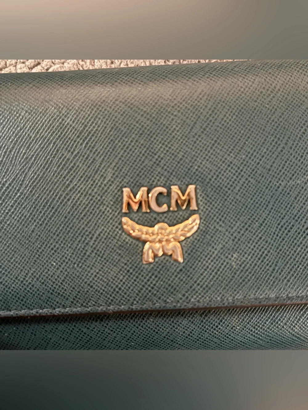 MCM Green Leather Trifold Wallet with Gold Emblem